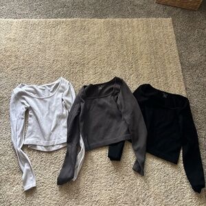 Bundle of 3 neutral long sleeve ribbed crop tops—perfect everyday basics! Includ